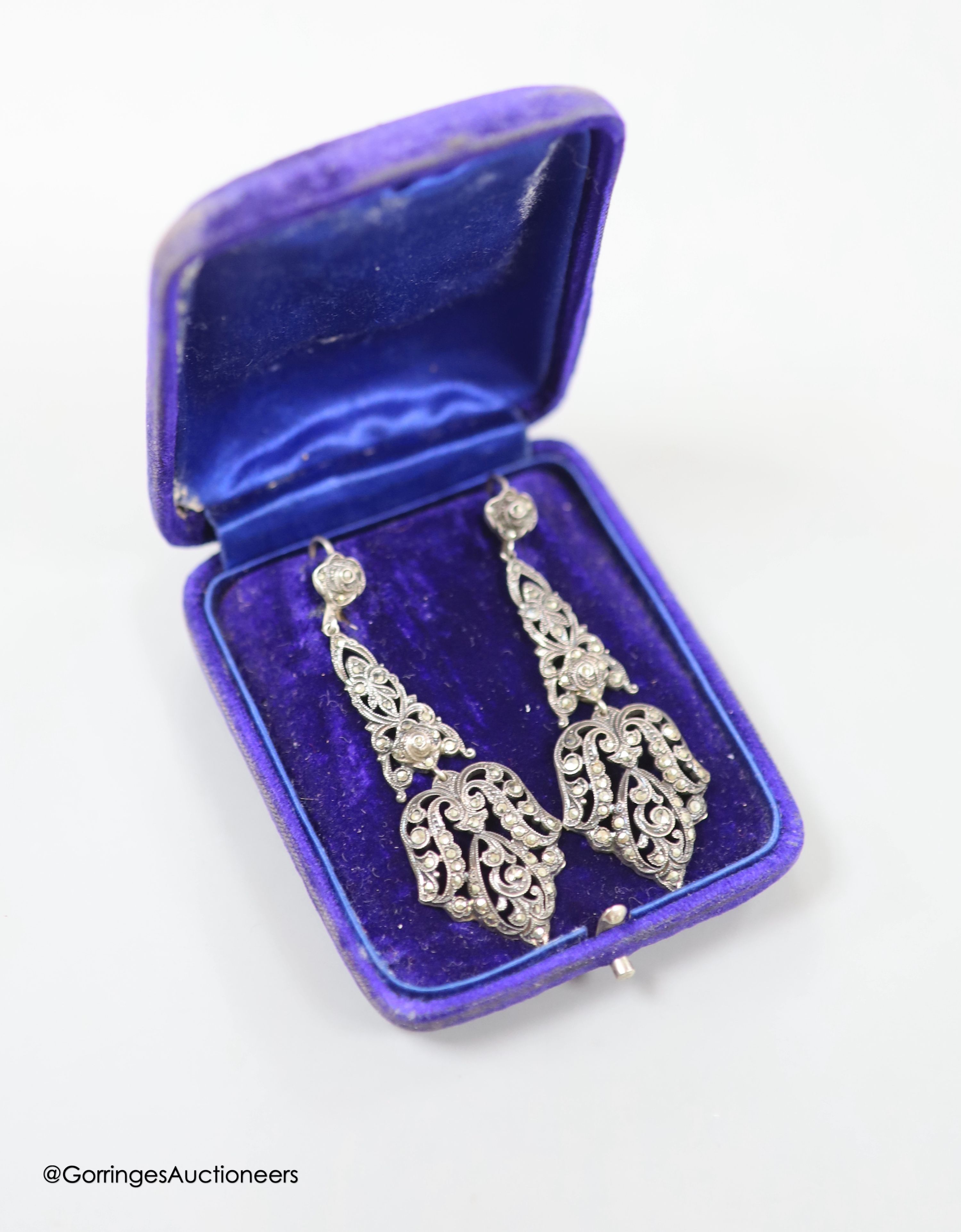 A pair of white metal and marcasite set drop earrings, 63mm.